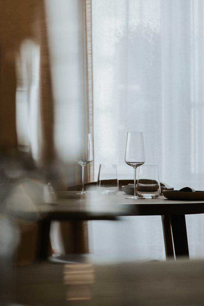 Wine glasses by the window