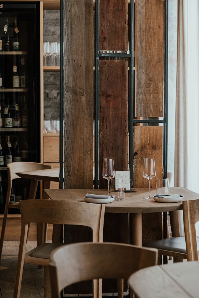 Tables by the wine wall