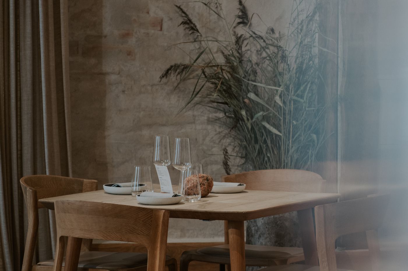 Soft light over a set table